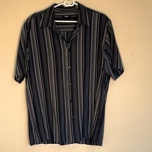 Alfani short sleeve straight bottom cut shirt.